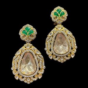 Gold-plated moissanite earrings.